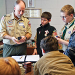 You might not expect rocks to be involved in an event focused on math, science, and technology. But this New Hampshire gathering exposes Scouts to nontraditional topics such as geology (below). Jim Frey, assistant Scoutmaster of Troop 28 in Dunstable, Mass., uses his college degree in geological engineering to discuss rock types with Scouts. (Photo courtesy of Debbie Hill.)